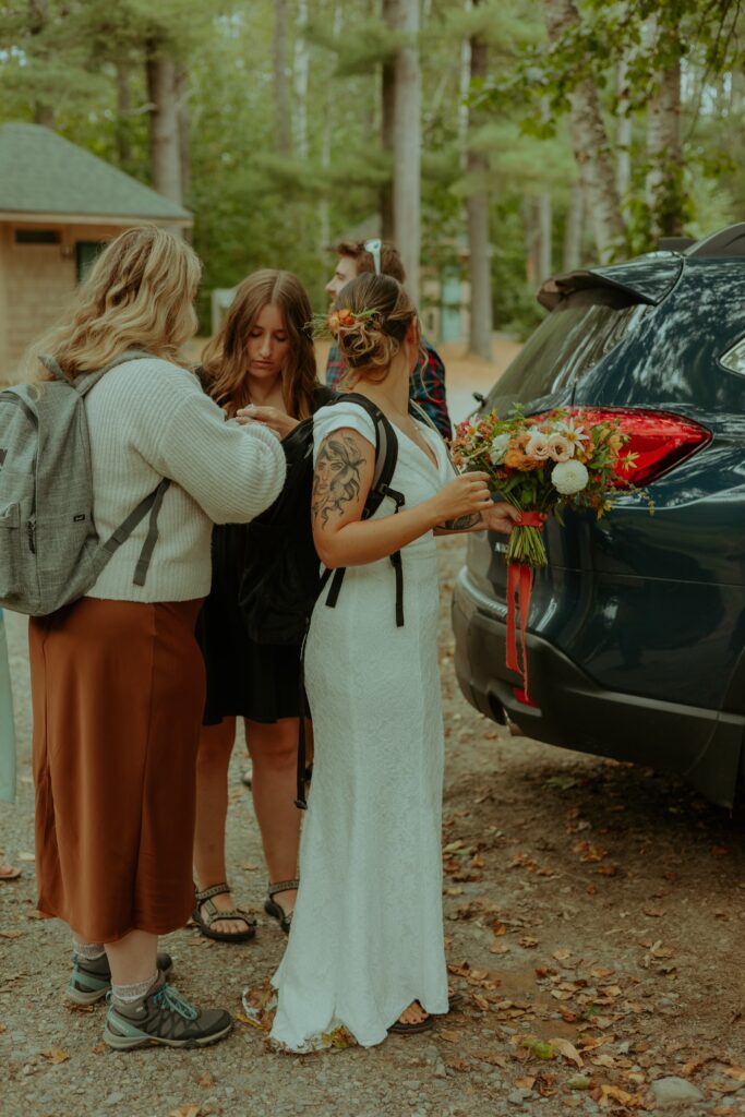 bride getting ready for her maine elopement