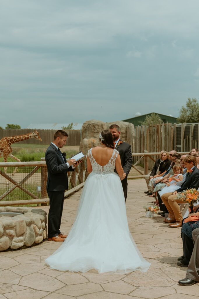couple saying their vows during their Columbus Zoo wedding ceremony