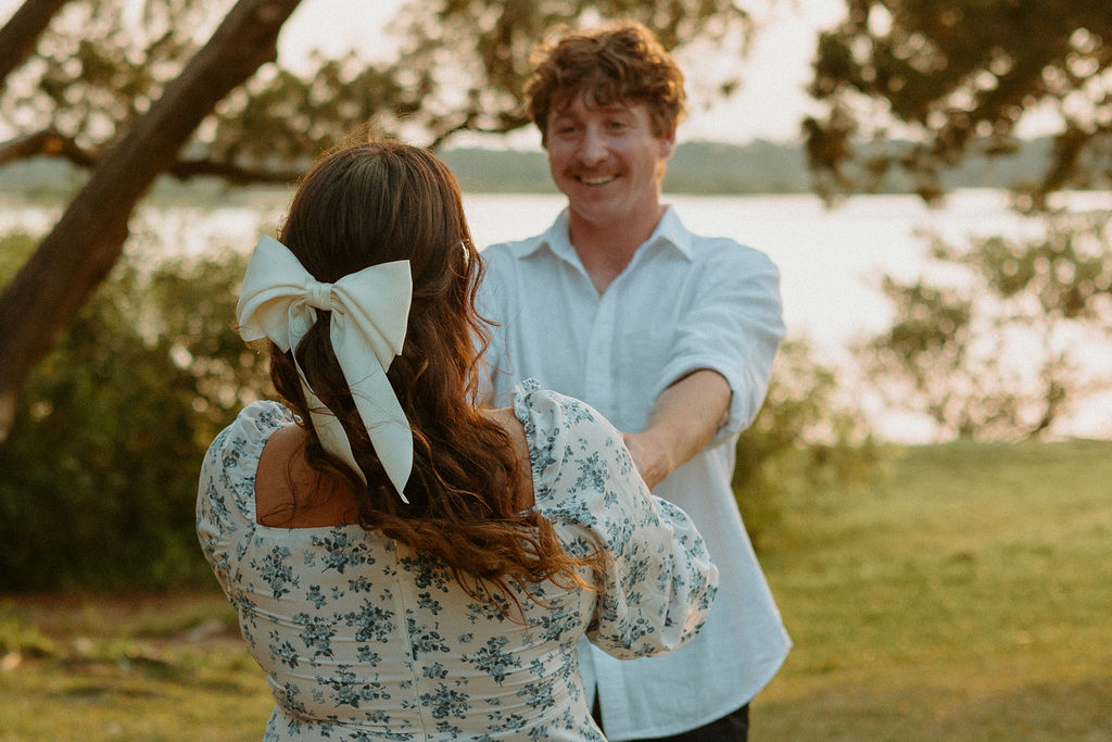 closeup of woman and man twirling in circles