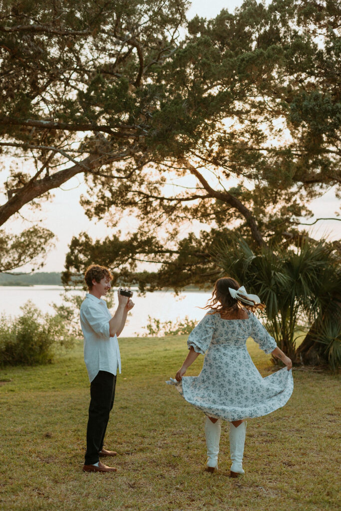 girl twirling in front of a camera in Washington Oaks Gardens 