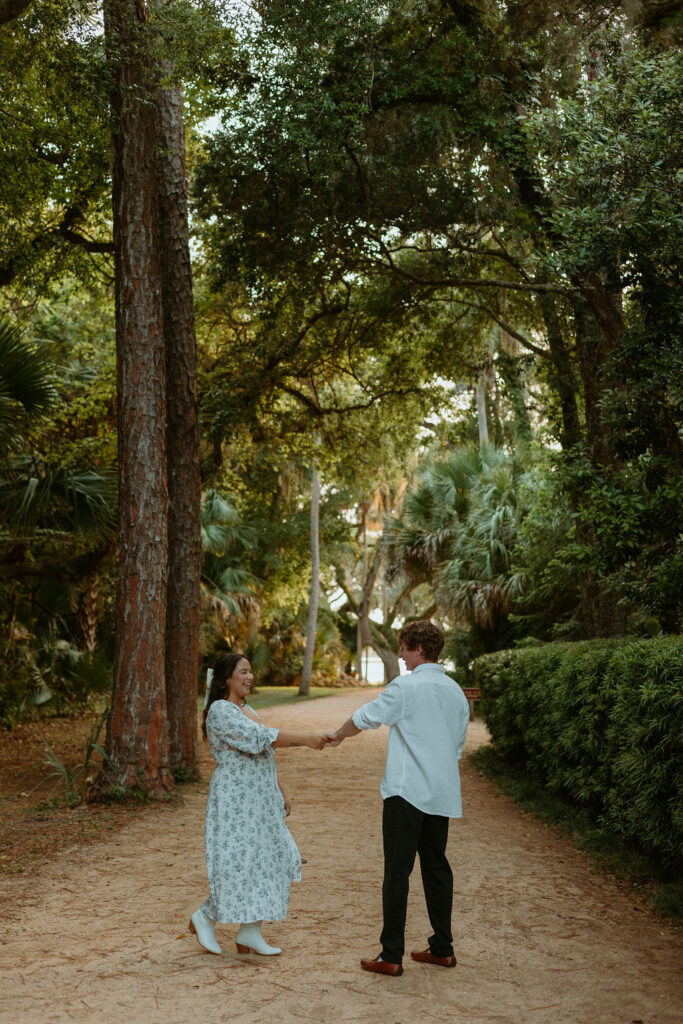 Washington Oaks Gardens photos of a girl holding hands with a boy 