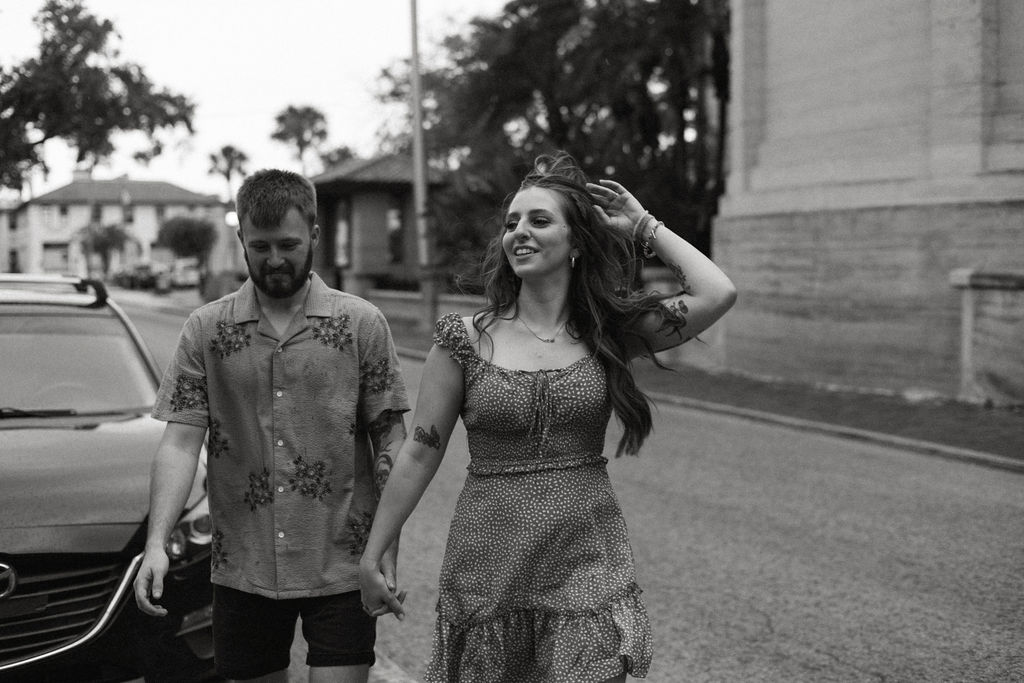 couple crossing the street in St Augustine