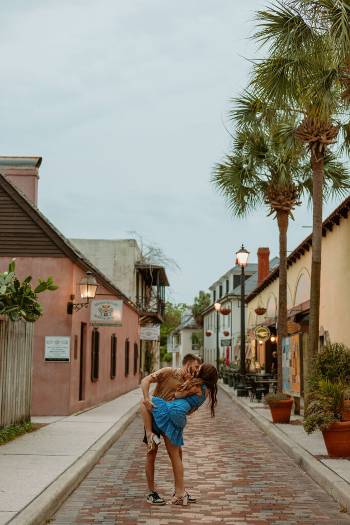 downtown St Augustine couple kissing dipping in the road 