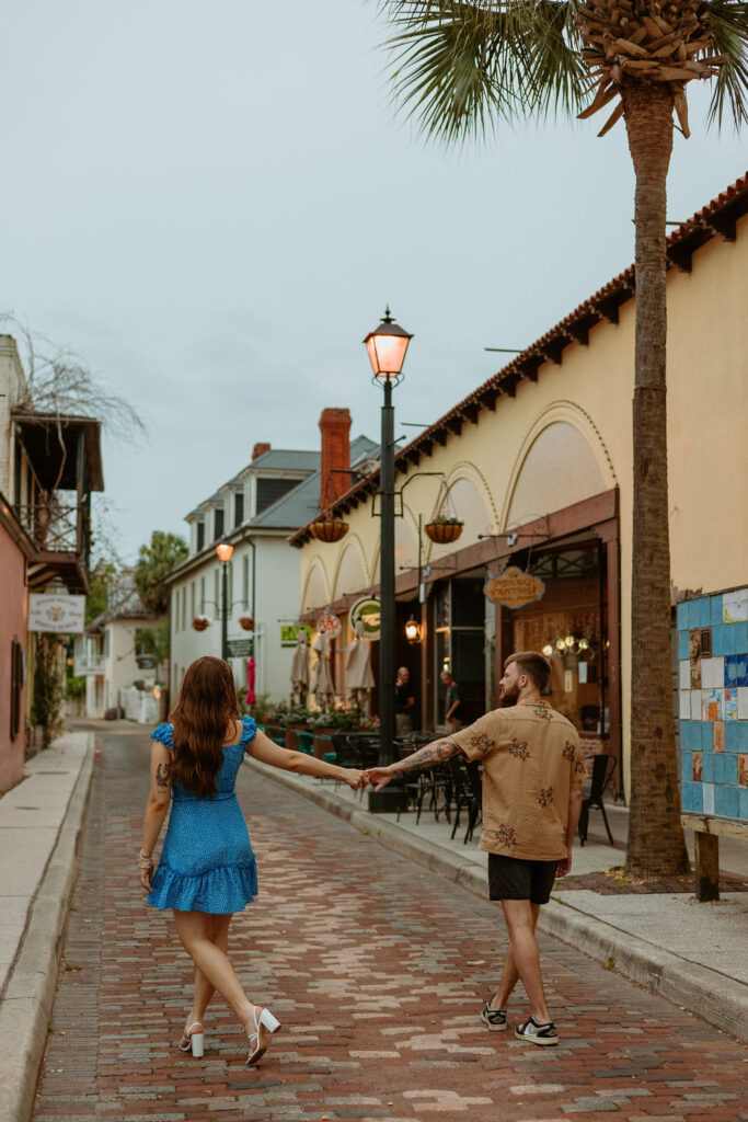 downtown St Augustine couple walking along the street 