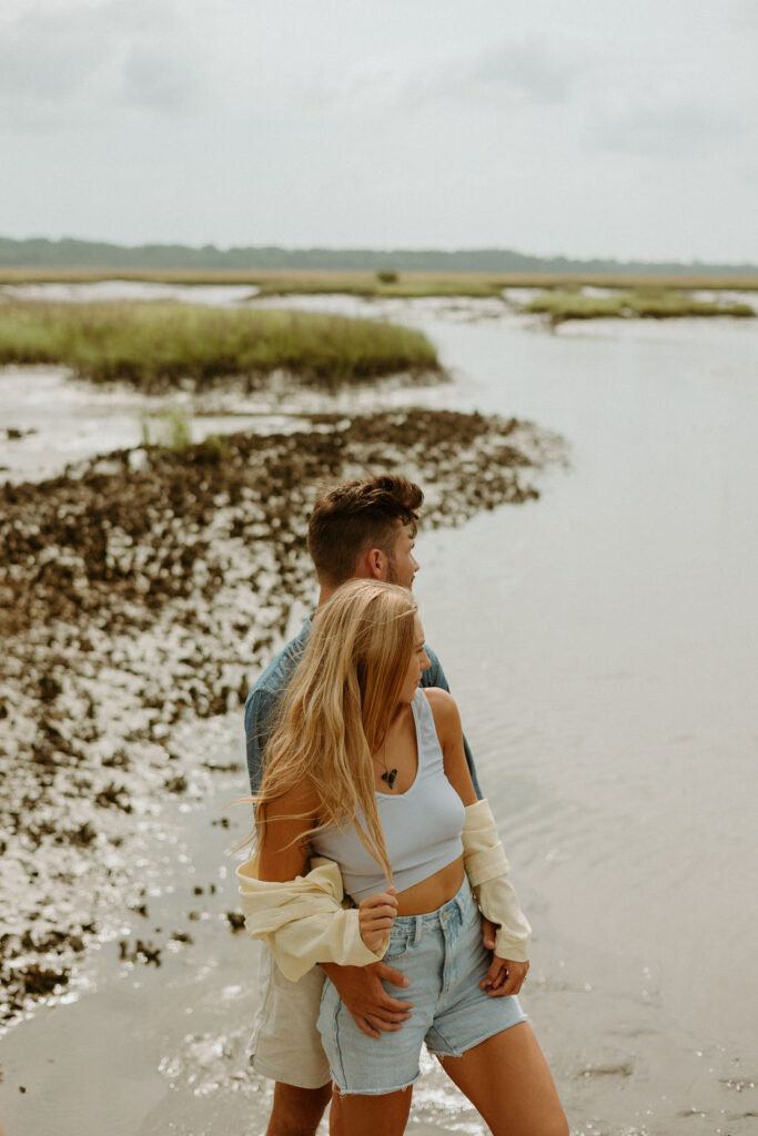 couple standing by the St Augustine  lagoon