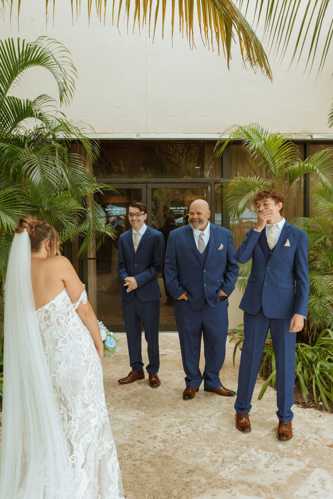 brides first look with her family at a puerto rico wedding