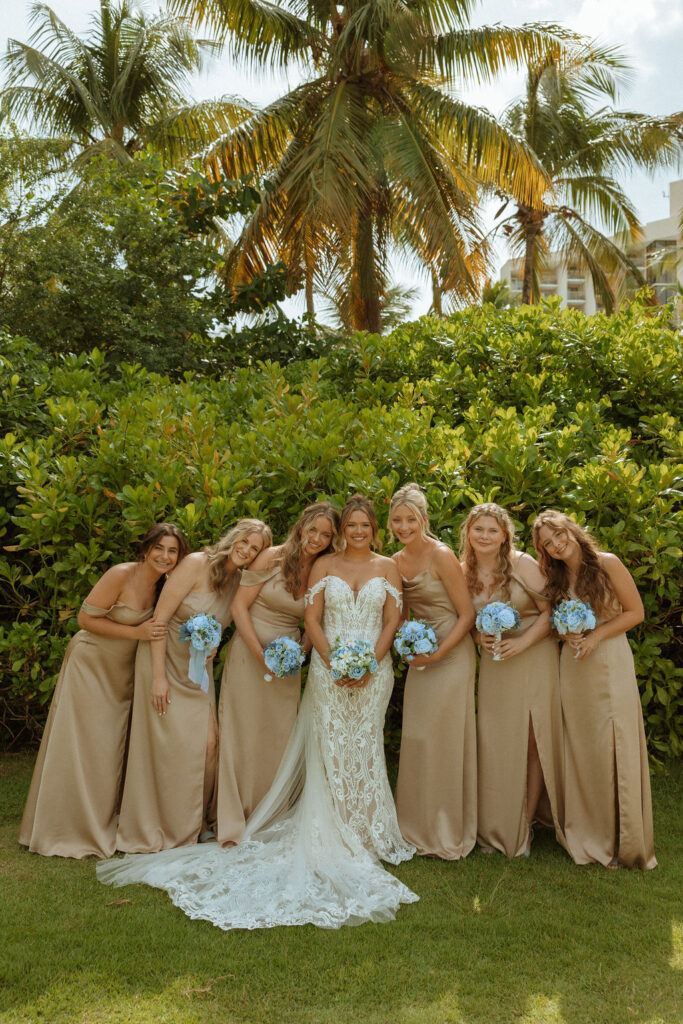 puerto rico wedding bridal party with bride and bridesmaids by palm trees