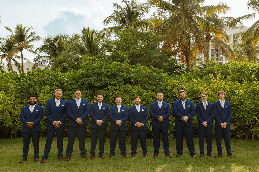 groomsmen posing for a photo at a puerto rico resort 