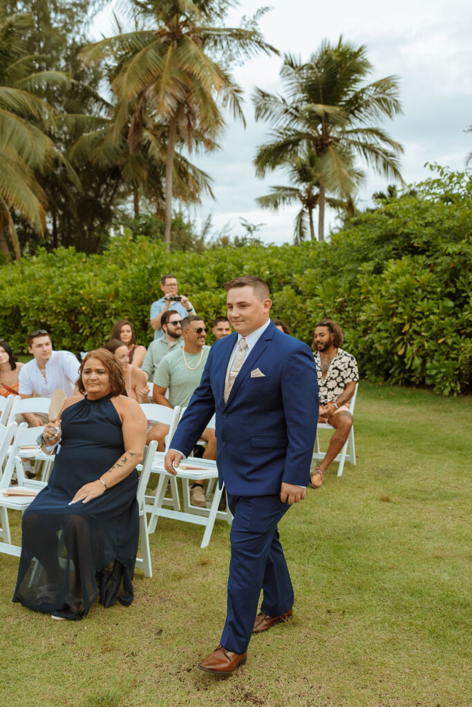 groom walking down the aisle for his puerto rico wedding ceremony