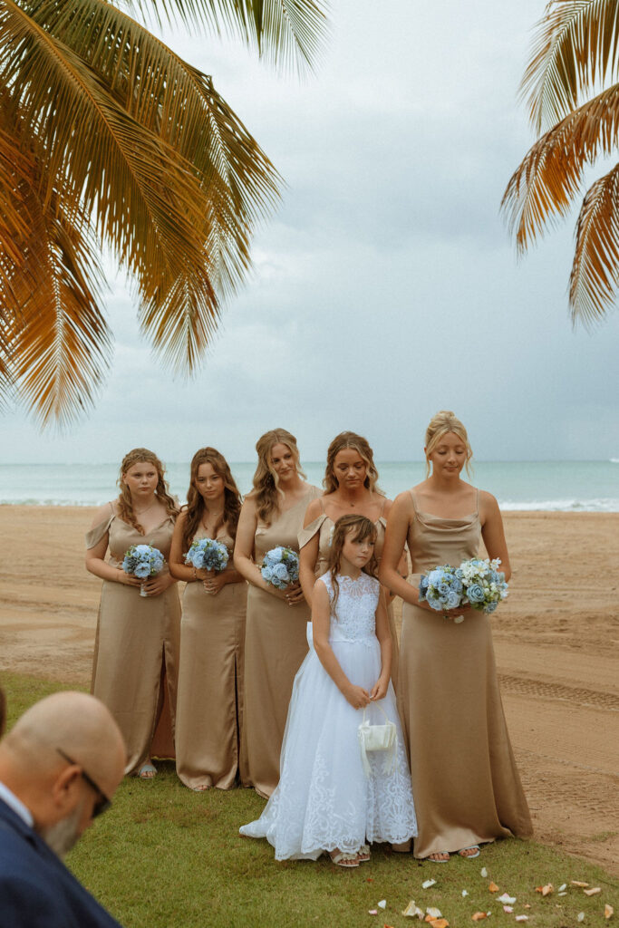 bridesmaids standing in line for wedding ceremony