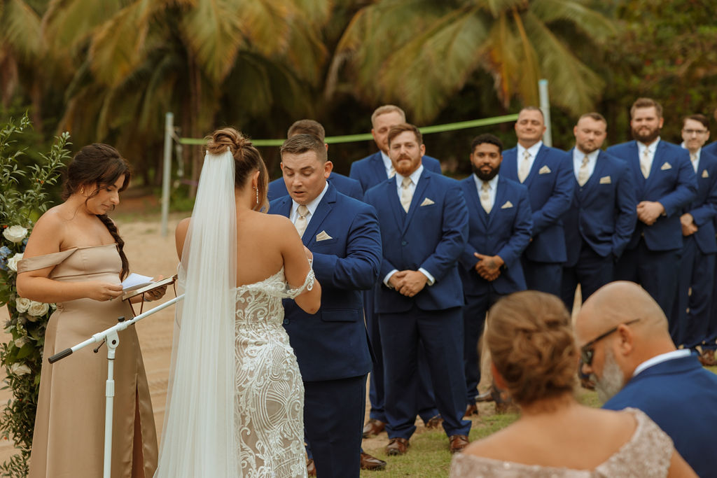 groom reading his vows during his puerto rico wedding