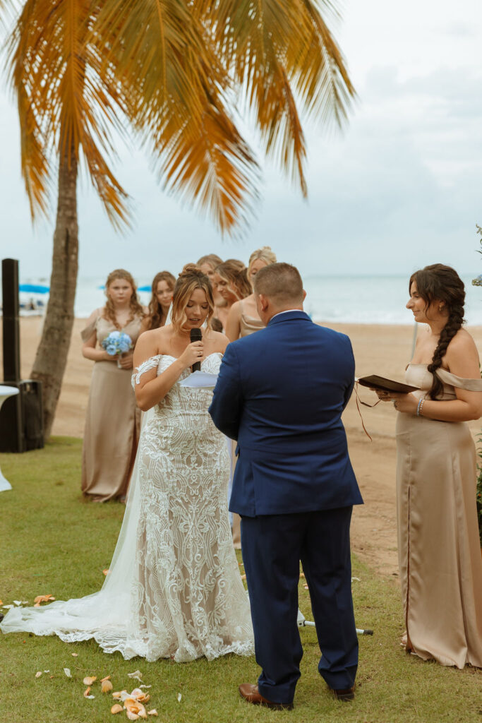 bride reading her vows during her ceremony