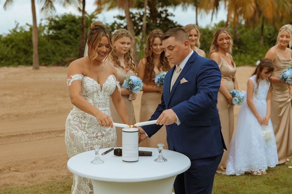 unity candle being lit during puerto rico wedding ceremony