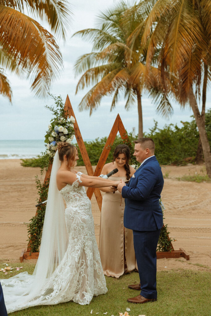 puerto rico wedding ceremony with a bride and groom holding hands 