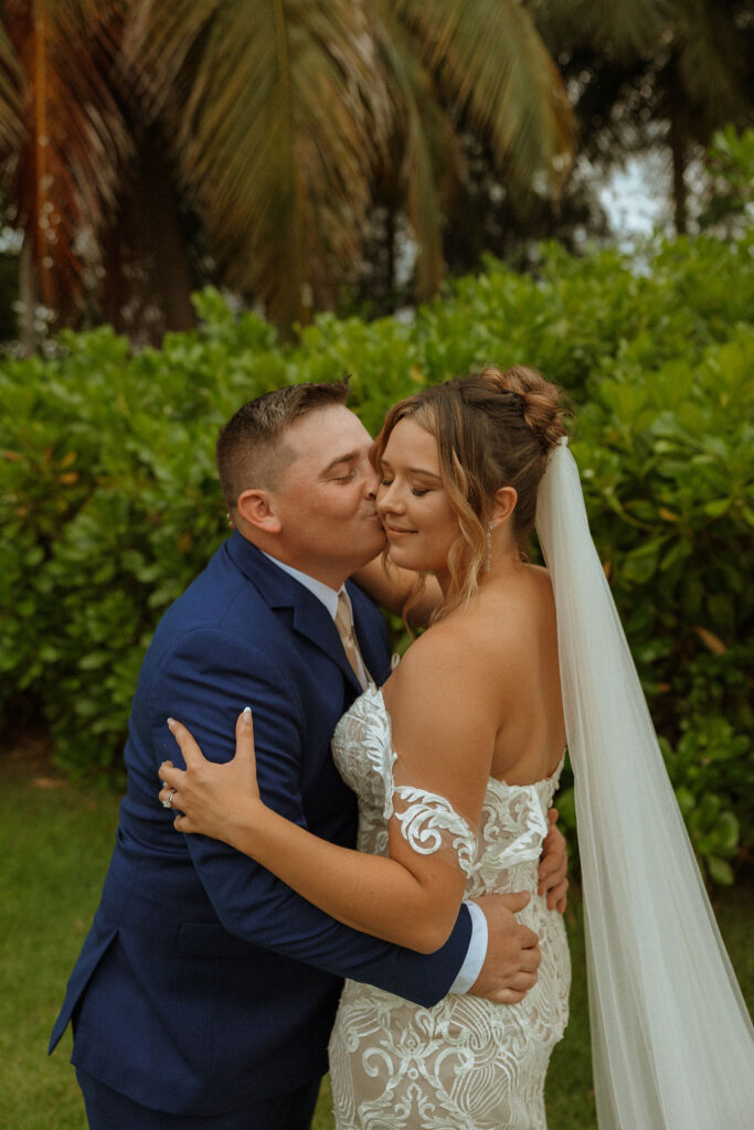 man kissing woman's cheek in puerto rico 