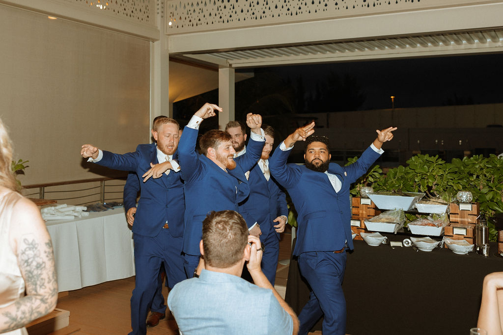 groomsmen entering puerto rico wedding reception