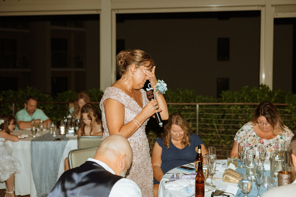 mother of the bride giving a prayer during their puerto rico reception