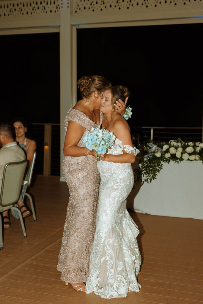 mother of the bride dancing with her daughter at her puerto rico wedding 