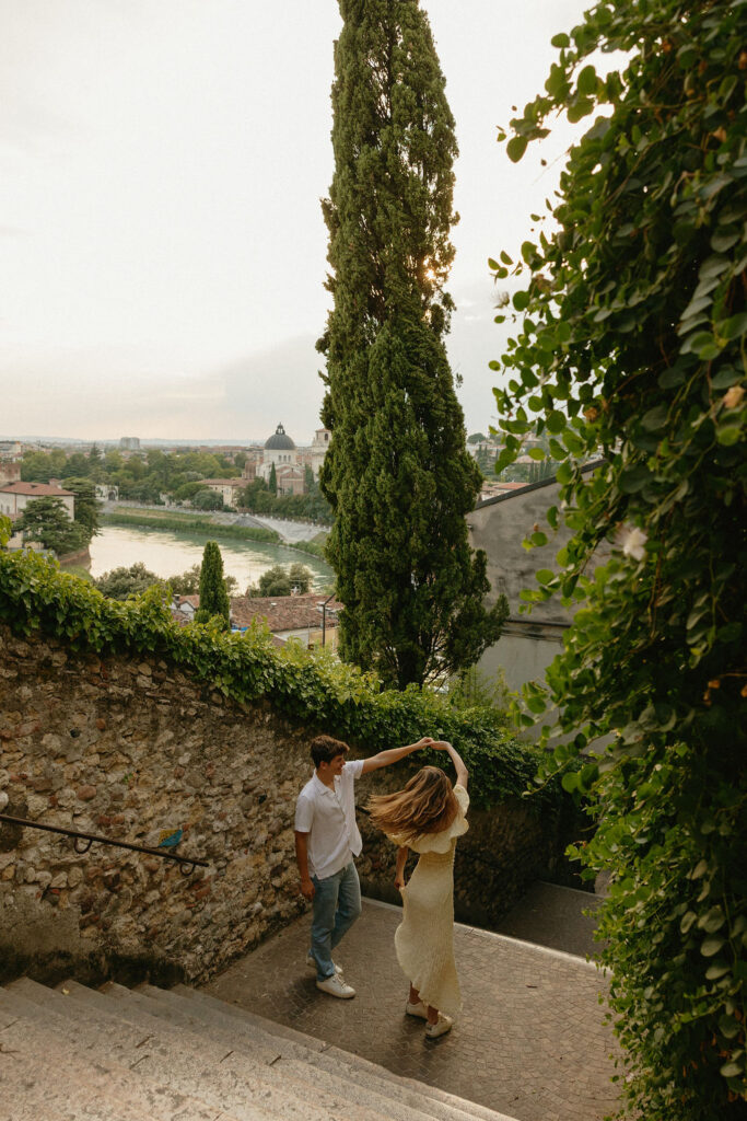 Spontaneous dance during engagement session in Verona, Italy