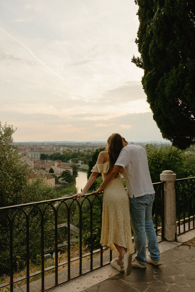 Couple on a balcony in Verona, Italy 