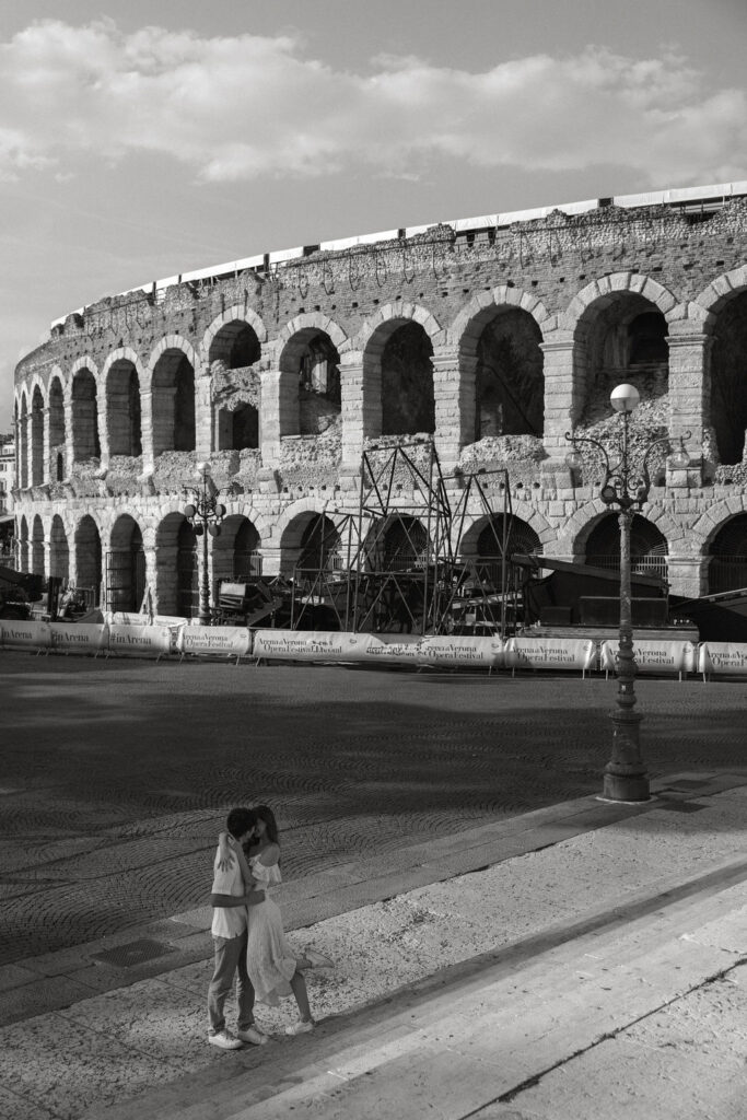 Verona arena captured in engagement session of couple dancing 