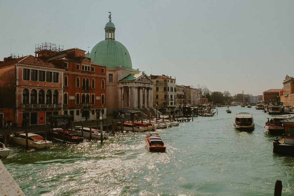 Venice Canal with historic buildings for a Venice Travel Guide