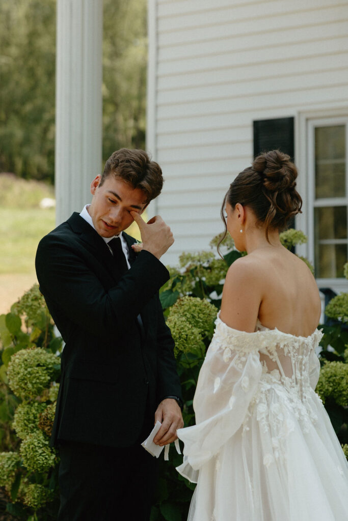 Couples first look by Magnolia Spring Farm's bridal suite
