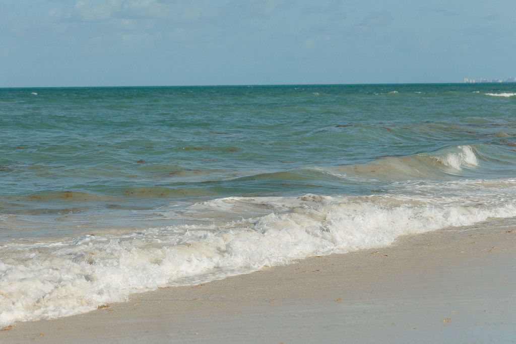 Waves rolling into the beach at Secrets Playa Blanca 
