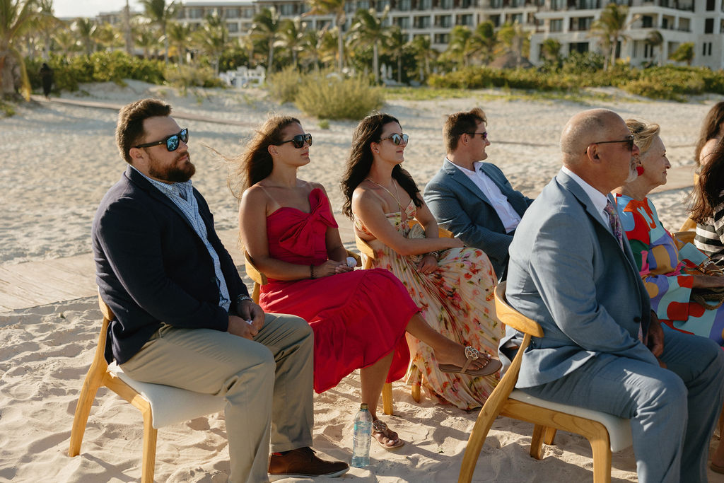 Family witnessing a ceremony at Secrets Playa Blanca in Mexico 