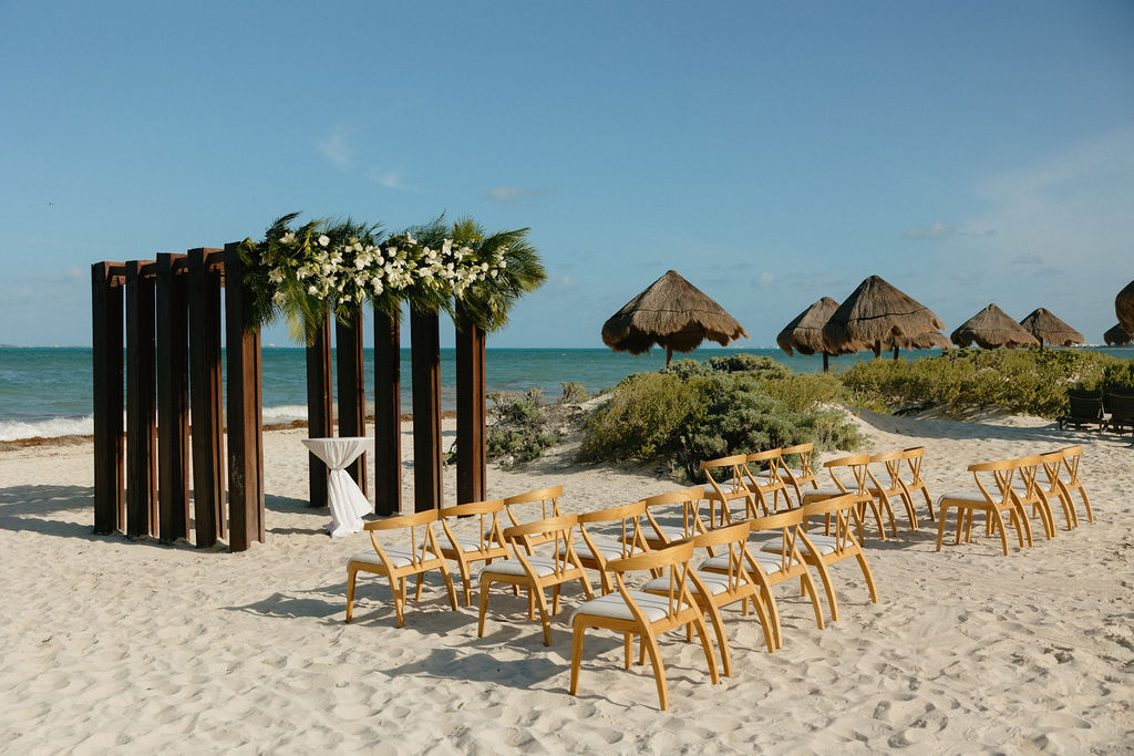 Beach wedding ceremony setup at Secrets Playa Blanca