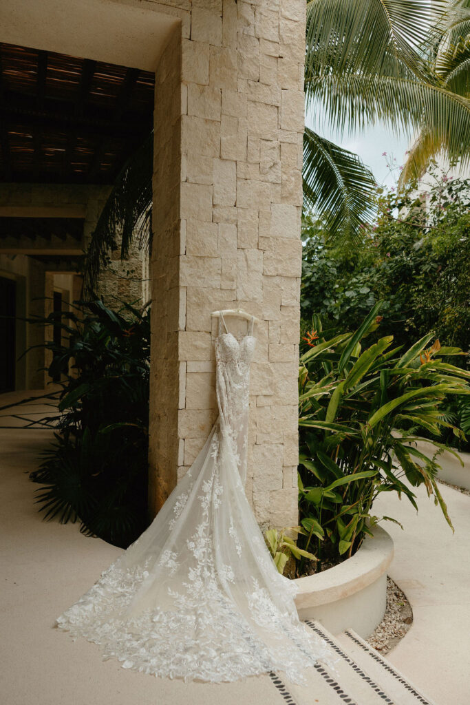 A dress hanging outside of Secrets Playa Blancas spa building