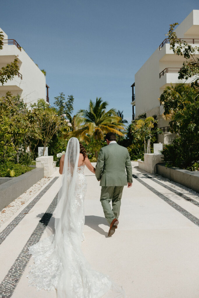 Couple walking through Secrets Playa Blancas plaza