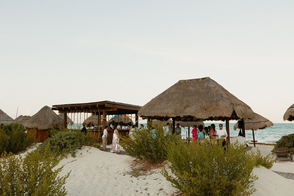 A wedding rehearsal dinner on the beach at Secrets Playa Blanca
